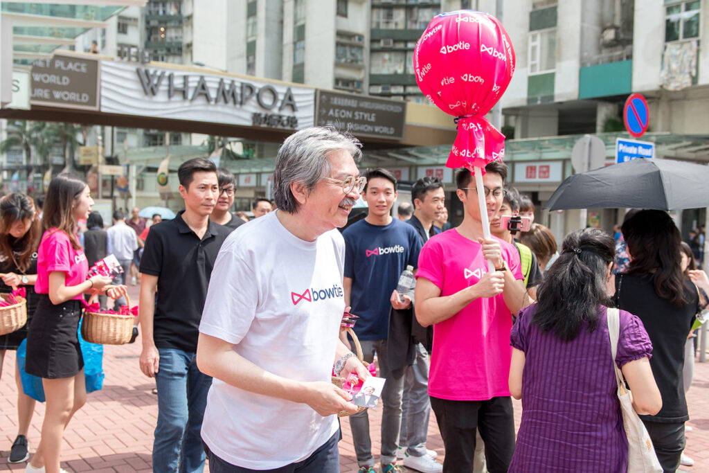 John Tsang, Bowtie Senior Advisor and former Financial Secretary of Hong Kong, distributing over 6.000 pieces of candy around Hong Kong